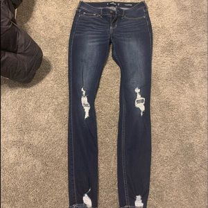 Low rise, dark wash skinny jeans.